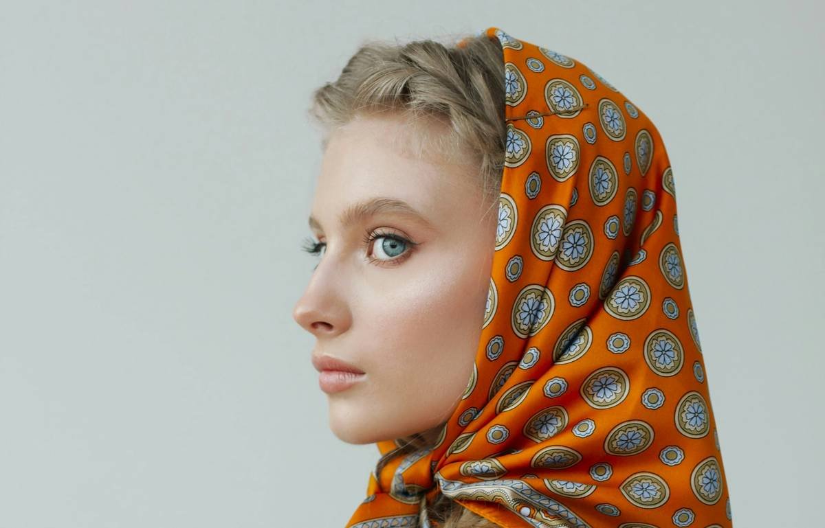 Side-by-side comparison of head scarf tying techniques for different hair types