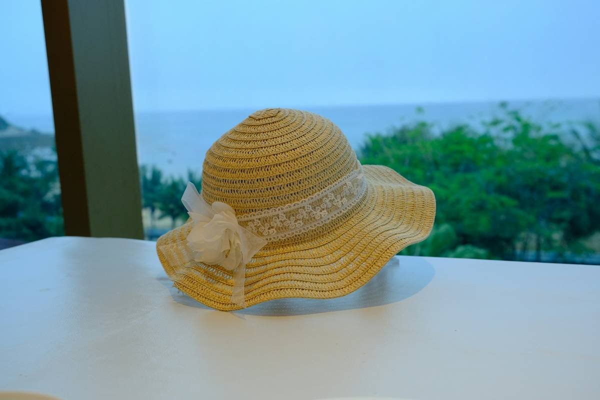 Close-up of UV safe hat fabric showing tight weave under sunlight